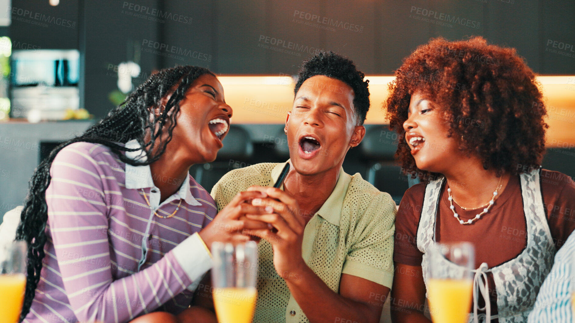 Buy stock photo Singing, karaoke and group of friends on sofa with mimosas on weekend for social event together. Music, fun and people with alcoholic drinks in living room with song, playlist or album in home.