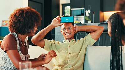 Buy stock photo Action, game and phone with people in living room of home together for bonding or social gathering. App, guess and thinking with friends acting in apartment for challenge, competition or reunion