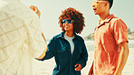Happy, fashion and group of friends on beach for summer vacation, travel reunion and hangout discussion. People, talking and sunglasses of tropical holiday, bonding together and sea tourism on island