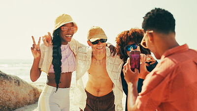 Buy stock photo Beach, friends and smartphone for picture, vacation and travel with tropical island, smile and nature. Ocean, people and group with cellphone, capture memory and excited with summer holiday and Miami