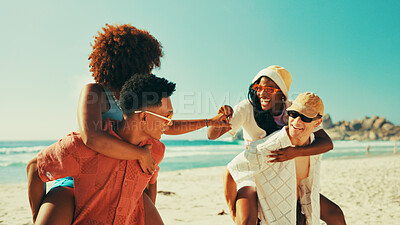 Buy stock photo Couple of friends, fist bump and piggyback on beach with people outdoor for holiday or vacation. Bonding, laughing or love with group of men and women on coast together for travel or weekend