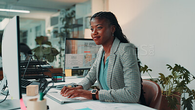 Buy stock photo Business, typing and black woman in office, computer and smile with internet, fashion magazine and editing. African person, journalist and employee in workplace, pc and research for article and email