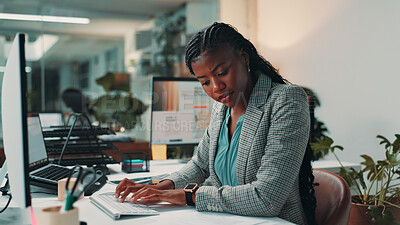Buy stock photo Black woman, documents and typing by computer in office for project, admin and review for proposal. Person, paperwork and notes for research, planning or feedback for perspective at creative agency
