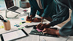 People, hands or writing with documents on sticky note for planning or brainstorming at office. Team, employees or group of designers with paperwork together for schedule agenda or ideas at workplace