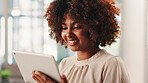 Business, online and happy woman on tablet in office, reading or content writer editing in startup. Technology, creative and African worker on app for copywriting story, ad campaign and social media