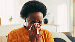 Blowing nose, sick and black woman in home with flu, cold or allergies with viral infection. Illness, tissue and African female person blowing nose for sinusitis, hayfever or virus in living room.