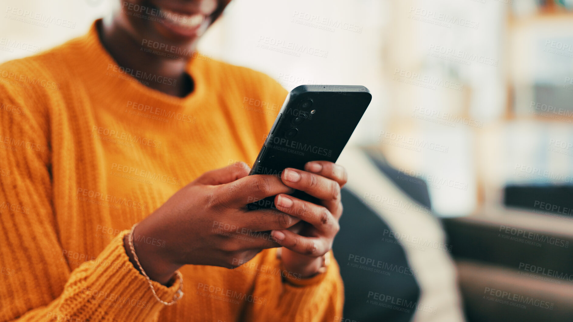 Buy stock photo Hands, smile and person with smartphone, texting and online dating with app in living room or relax. Home, typing and woman with mobile for communication, connection and happy for chat in lounge