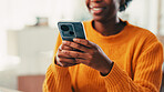 Phone, hands and woman with smile, website search and article for weekend break. Apartment, living room and person with cellphone, social media or online reading for ebook or internet entertainment