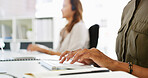 Person, hands and typing with keyboard at call center for research, email or communication. Closeup, consultant or agent writing with computer for data entry, report or browsing on desk at workplace