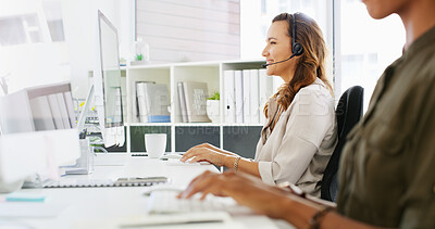 Buy stock photo Happy woman, consultant and typing with headset at call center for online communication or email. Female person, agent or virtual assistant with smile on computer for advice, help or customer service