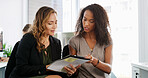 Business people, conversation and women in office, document and feedback for financial report. Employees, economy and mentor in workplace, cooperation and meeting for revenue review, talk or advice