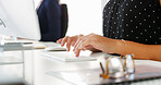 Person, hands and typing with keyboard for research, email or communication at office desk. Closeup, journalist or reporter writing with computer for news article, publish or network at workplace