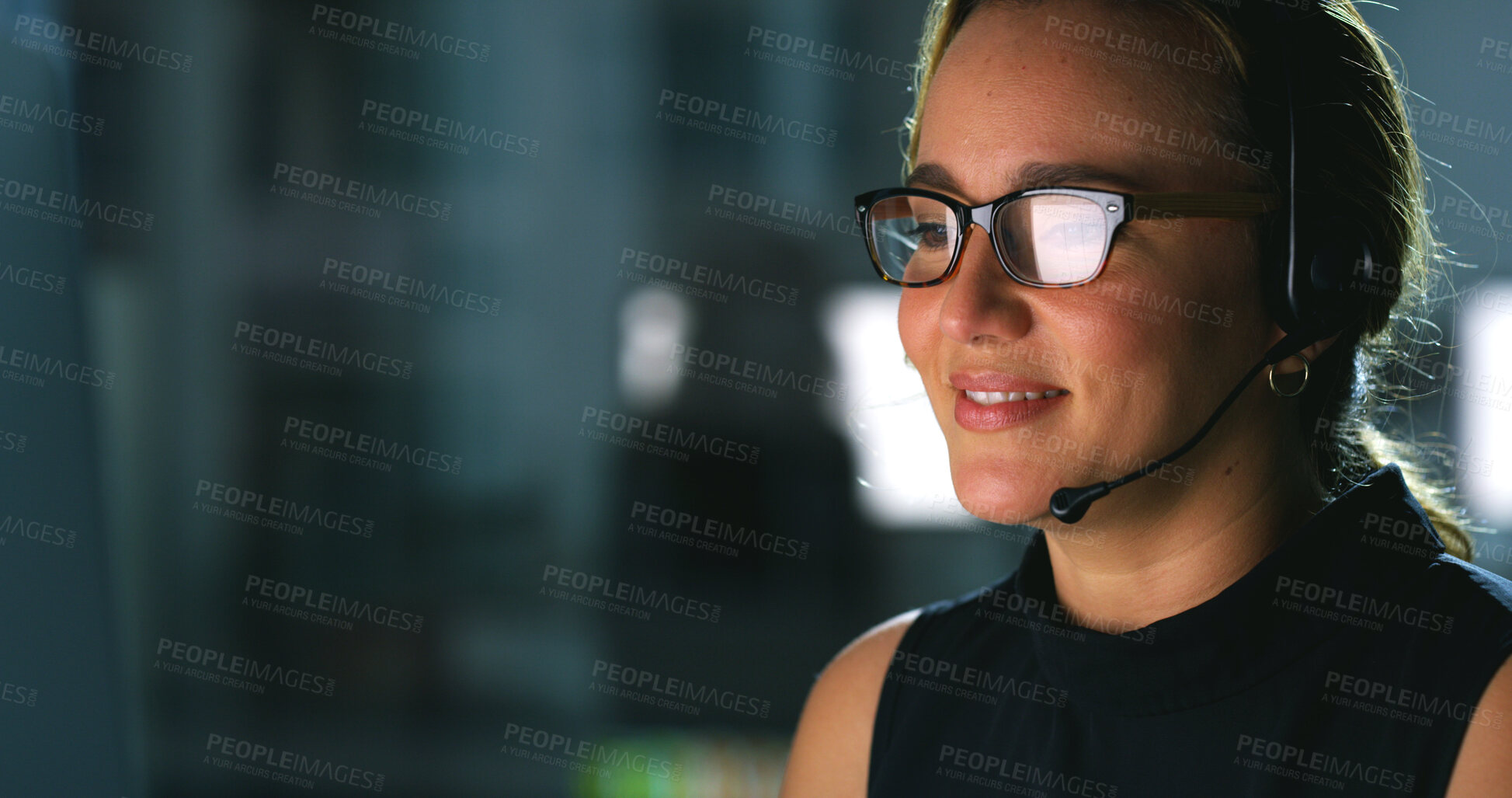 Buy stock photo Headset, night and woman in office with consultation for troubleshooting with online software service. Space, IT and female technical support consultant at contact center for network configuration.