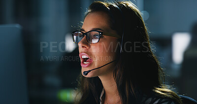 Buy stock photo Headset, night and woman in office with consulting for troubleshooting with online  computer software. Glasses, IT and female technical support consultant at contact center for network help desk.