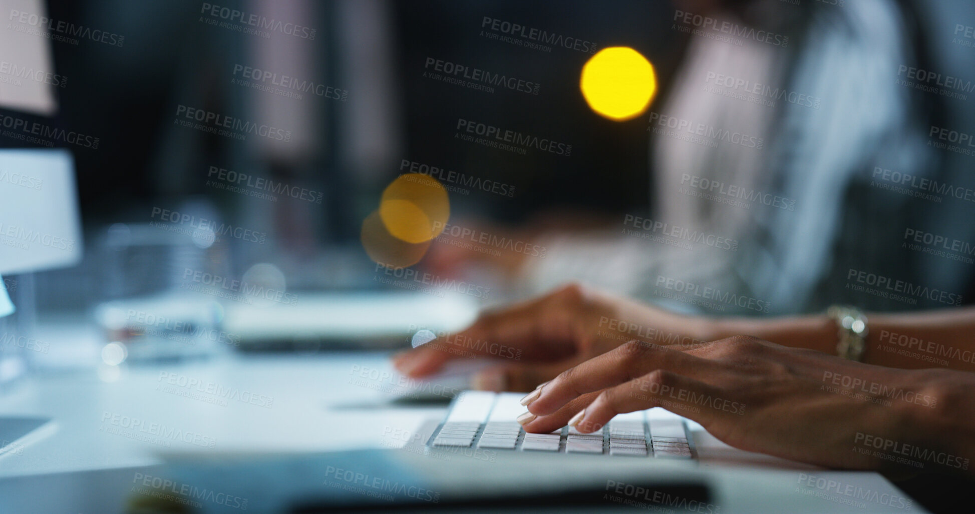 Buy stock photo Person, hands and typing with keyboard at night for research, email or communication at office desk. Closeup, journalist or reporter working late on computer for news deadline or publish at workplace