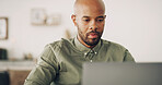 Black man, remote work and laptop at home for startup planning, research or communication with email. Male entrepreneur, technology and internet for freelancing with online connection in house