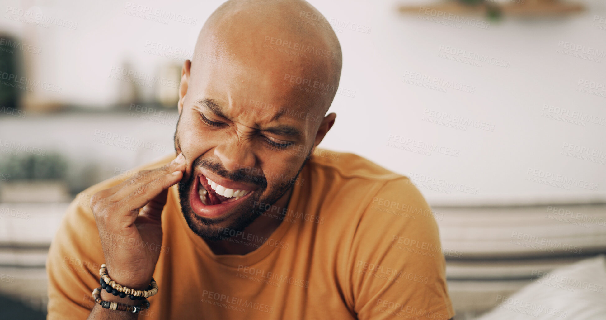 Buy stock photo Toothache, sensitive and man in home with dental problem for cavity, gum disease or gingivitis. Pain, dentistry and male person with impacted wisdom teeth for tension, pressure or plaque in house.
