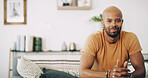 Portrait, space and weekend with man in living room of home for break, time off or wellness. Calm, peaceful and relax with confident person in apartment for chilling or comfort on Saturday morning