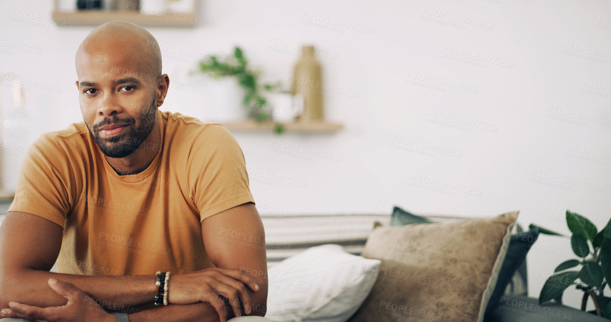 Buy stock photo Portrait, relax and space with man in living room of home for break, time off or wellness. Calm, rest and weekend with confident person in apartment for chilling or comfort on Saturday morning