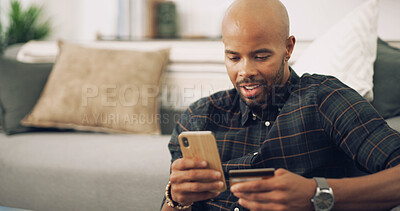 Buy stock photo Home, black man and mobile with credit card for online shopping, password information and payment. Lounge, male person and phone with debit for ecommerce, transaction and subscription for application