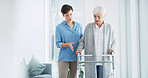 Help, caregiver and old woman with walker in home for healthcare, physio or support in retirement. Senior care, physiotherapist and elderly person with walking frame for mobility exercise in recovery