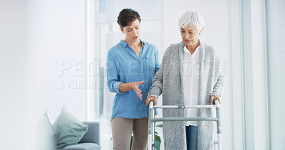 Buy stock photo Help, caregiver and old woman with walker in home for healthcare, physio or support in retirement. Senior care, physiotherapist and elderly person with walking frame for mobility exercise in recovery