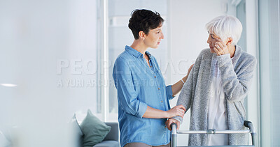 Buy stock photo Senior woman, caregiver and walker with talk, guide and support for care, listen and recovery in home. People, helping hand and elderly person with disability, rehabilitation or balance in retirement