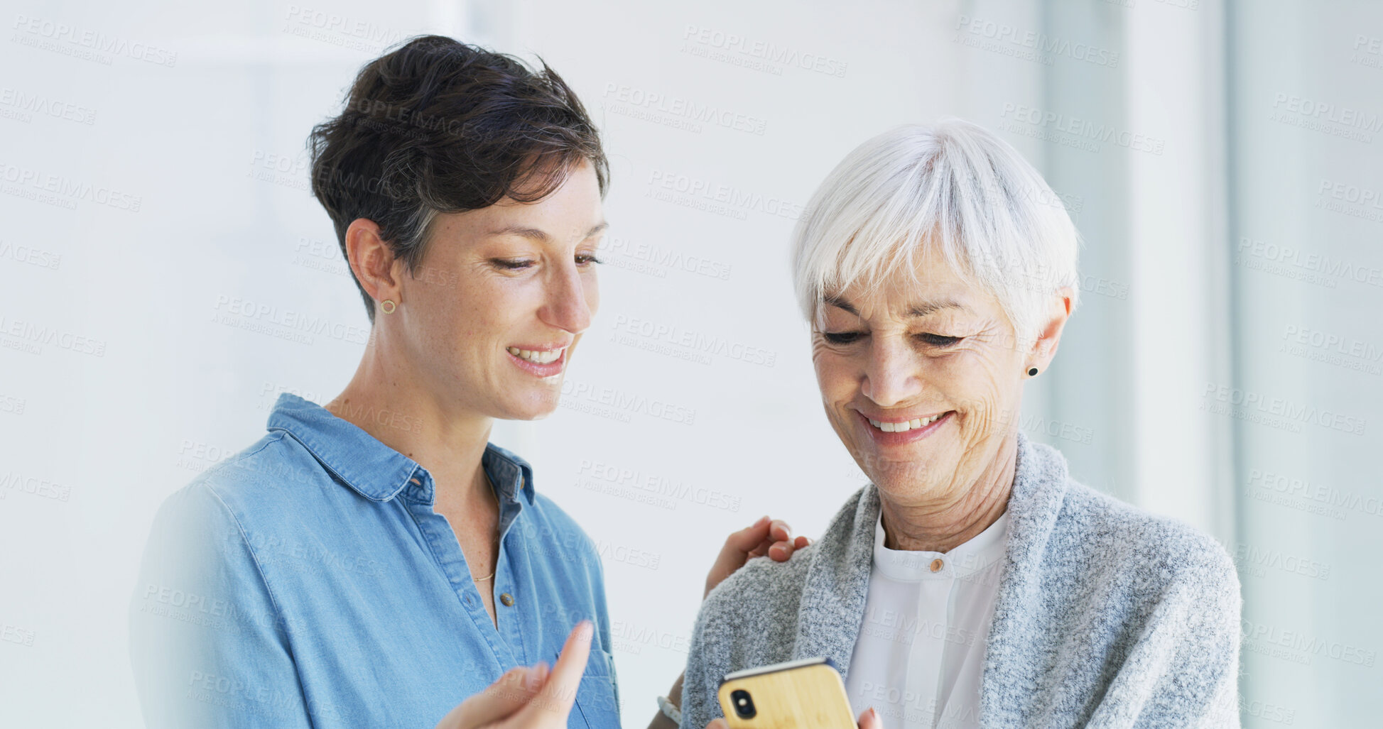 Buy stock photo Phone, help and person with elderly woman for mobile app, internet and assistance in home. Retirement, caregiver and happy women on smartphone for communication, connection and online contact
