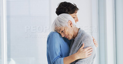 Buy stock photo Sad, comfort and woman hugging senior mother in retirement home for grief, support or loss. Emotional, love and female person embracing elderly mom for empathy, care and emotions in nursing facility.