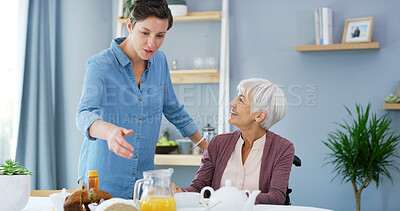 Buy stock photo Senior, woman and caregiver with food in retirement for lunch meal, healthcare support and morning nutrition. Happy, assisted living and person with disability in home for helping hand and assistance