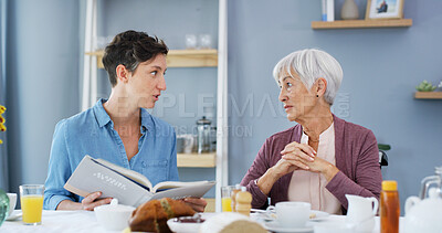 Buy stock photo Senior woman, caregiver and book in home, breakfast and bonding in retirement, listen and together. People, connection and literature in morning for care, storytelling and support with novel in house