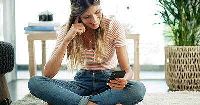 Buy stock photo Woman, phone and laugh on floor with relax, social media and funny message in text. Female person, mobile and happy in home for meme website, comedy video and gossip conversation on contact app