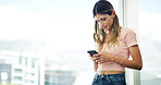 Woman, phone and typing in home with relax, social media and message in texting app. Female person, mobile and online at window space for website, comment section and gossip conversation with contact