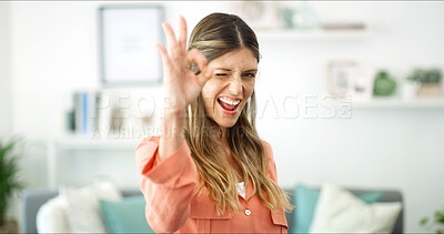 Buy stock photo Home, wink and woman with ok sign, portrait or like emoji with thank you in lounge. Face, apartment or happy person with pride, hand gesture or agreement with perfect symbol, icon and victory