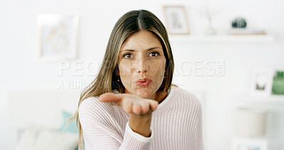 Buy stock photo Portrait, woman and blowing kiss in living room for support, kindness and greeting gesture with care. Lounge, person and romantic emoji for flirting, confidence and sign for love or affection in home