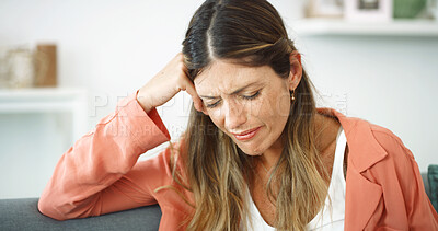 Buy stock photo Home, crying and woman in living room, mental health and heartbroken by death, grief and thinking. Depression, overwhelmed and person with sadness for loss, reflection and anxious in apartment