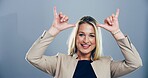 Shaka, emoji and portrait of woman in studio with hand gesture for business success, achievement and good news. Mockup space, professional and happy person with sign for winning on blue background