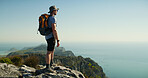 Hiking, health and thinking with man on cliff for travel adventure, nature and workout. Space, reflection and exercise with person outdoor view on mountain for trekking holiday, explore and peace