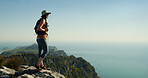 Hiking, space and thinking with woman on cliff for travel adventure, nature and workout. Fitness, reflection and exercise with person outdoor view on mountain for trekking holiday, explore and peace