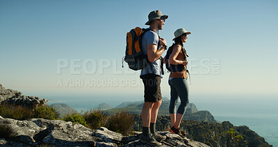 Buy stock photo Couple, hiking and view on mountain with horizon, adventure and travel for backpacking in nature. Summit, support and vacation, woman and man outdoor for trekking and sightseeing space in Thailand