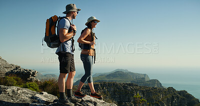 Buy stock photo Couple, hiking and people on mountain with horizon, adventure and travel for backpacking in nature. Summit, support and vacation, woman and man trekking for view and sightseeing space in Thailand