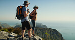 Happy couple, hiking or mountain view with blue sky for travel, sightseeing vacation or adventure. Man, woman or hikers with smile, hat or backpack for trekking challenge, journey or outdoor exercise