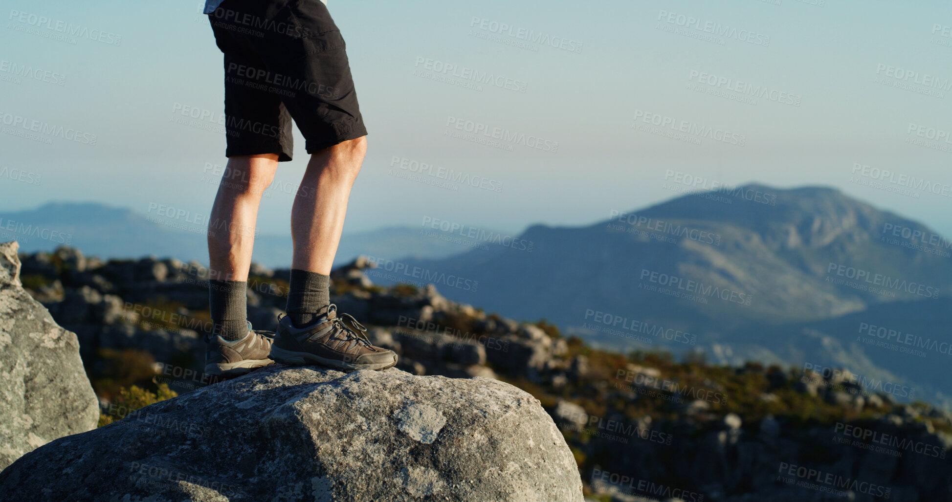 Buy stock photo Person, legs and hiker mountain view on rock for adventure, trekking journey or fitness in nature. Shoes, feet or cliff with peak or horizon for hiking trail, travel path or sightseeing destination