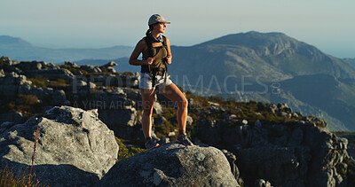 Buy stock photo Hiking, rock and thinking with woman in nature for fitness, travel adventure and environment. Health, reflection and relax with person outdoor view on cliff for trekking holiday, explore and mountain
