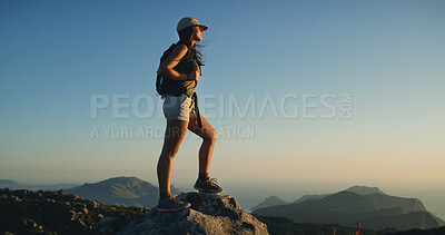 Buy stock photo Woman, hiker and mountain with backpack for sunset, hiking adventure or conquer on rock. Female person, tourist or explorer with bag on cliff or peak for trekking journey or trip on mockup space