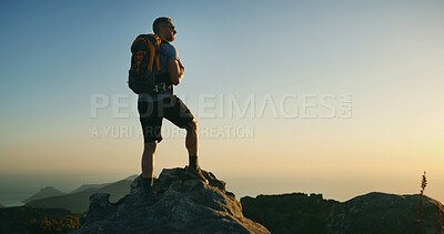 Buy stock photo Man, hiker and mountain with backpack for sunset view, hiking adventure or conquer on rock. Male person, tourist or explorer with bag on cliff or peak for trekking journey or trip on mockup space