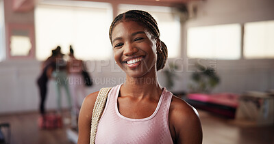 Buy stock photo Fitness, happy and woman in portrait in yoga class for wellness, about us pride or confidence. Personal trainer, yogi and smile for pilates session, posture exercise or health with bag for sportswear