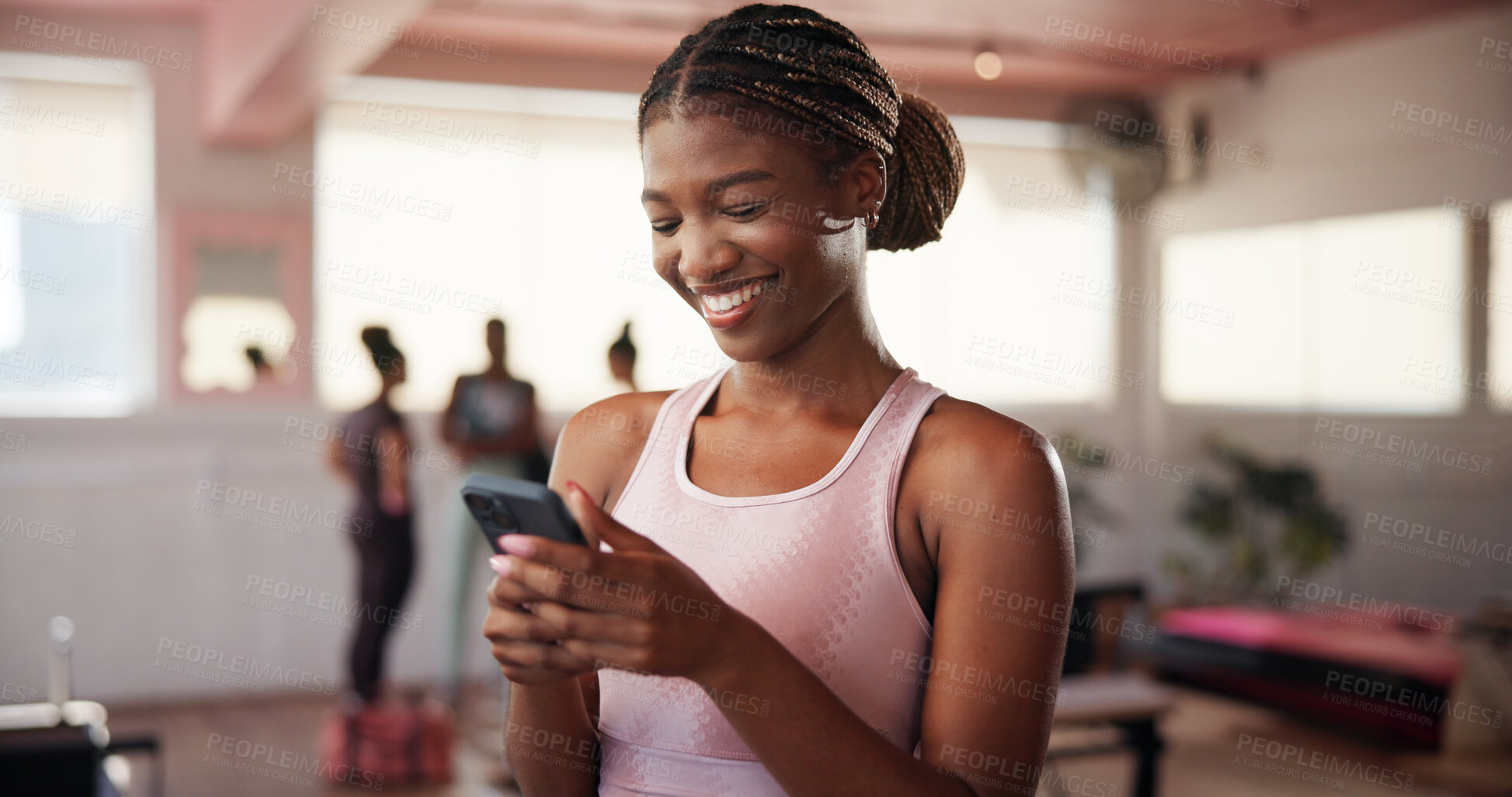 Buy stock photo Gym, woman and happiness with smartphone for fitness, exercise video or funny reel on social media. Health club, female person and laugh with mobile for virtual tutorial, workout break or application