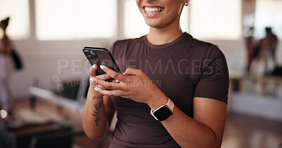 Buy stock photo Gym, woman and laughing with mobile for fitness, exercise video and funny reel on social media. Health club, female person and hands with smartphone for virtual tutorial, workout break or application