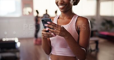 Buy stock photo Fitness, woman and chat with smartphone in gym, health club or app for workout reel on social media. Hands, female person and smile with mobile for exercise video, tips or virtual tutorial for cardio